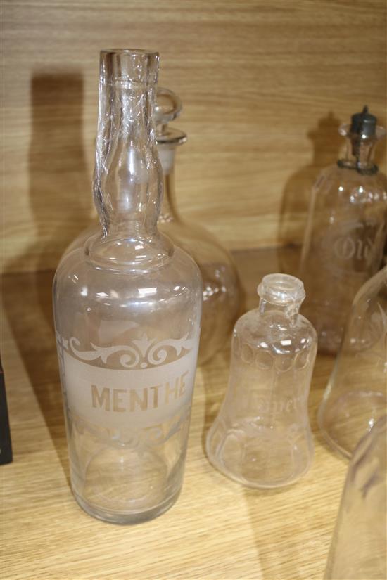 A quantity of glass decanters tallest 31cm